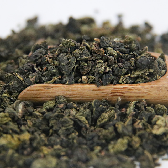 Follas de té con sabor a pexego branco oolong